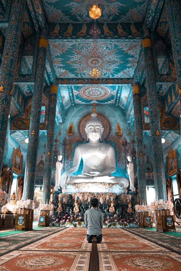 Peron Praying at Buddha For Good luck